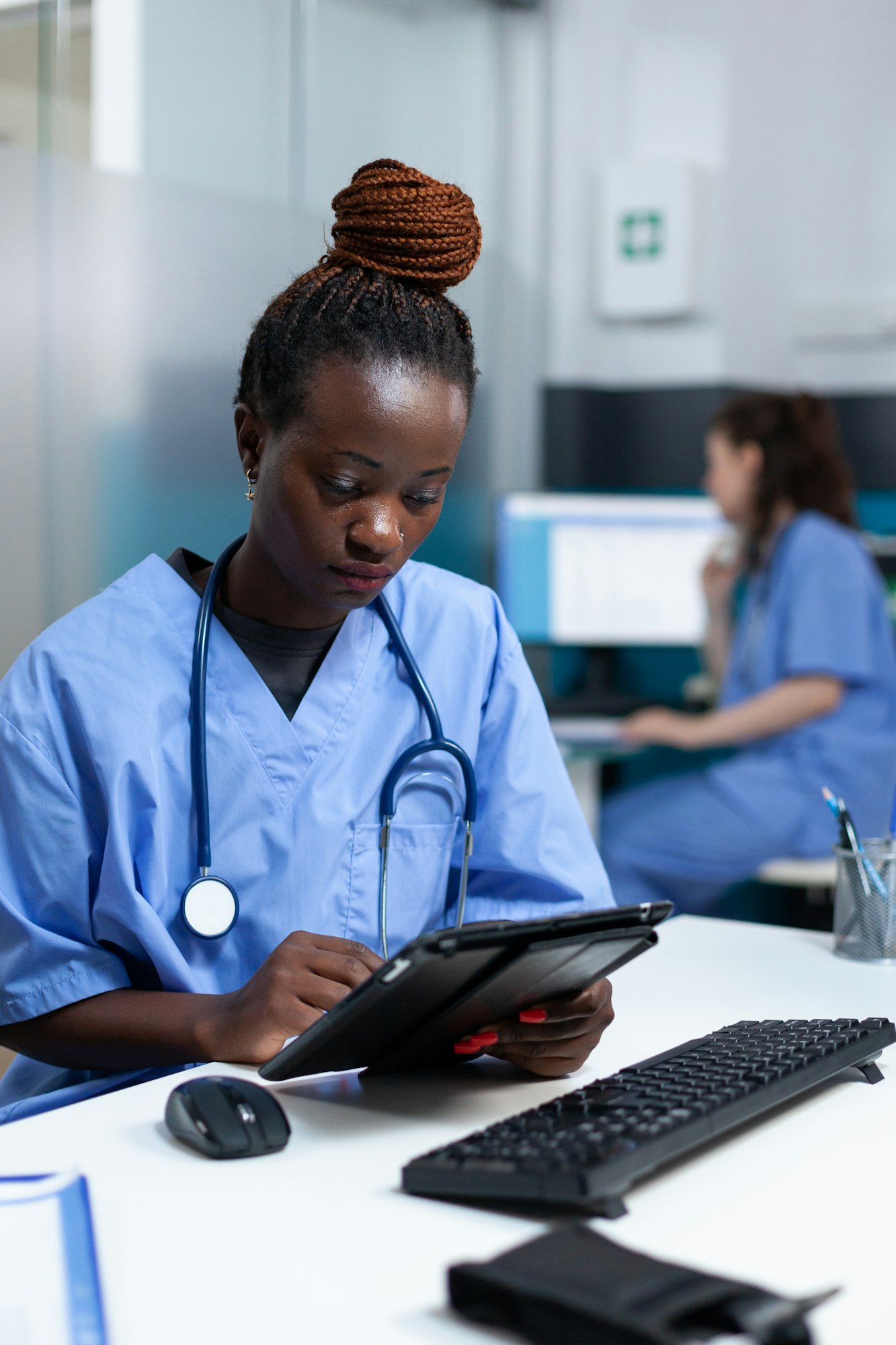 African american asisstance in medical uniform analyzing sickness prescription