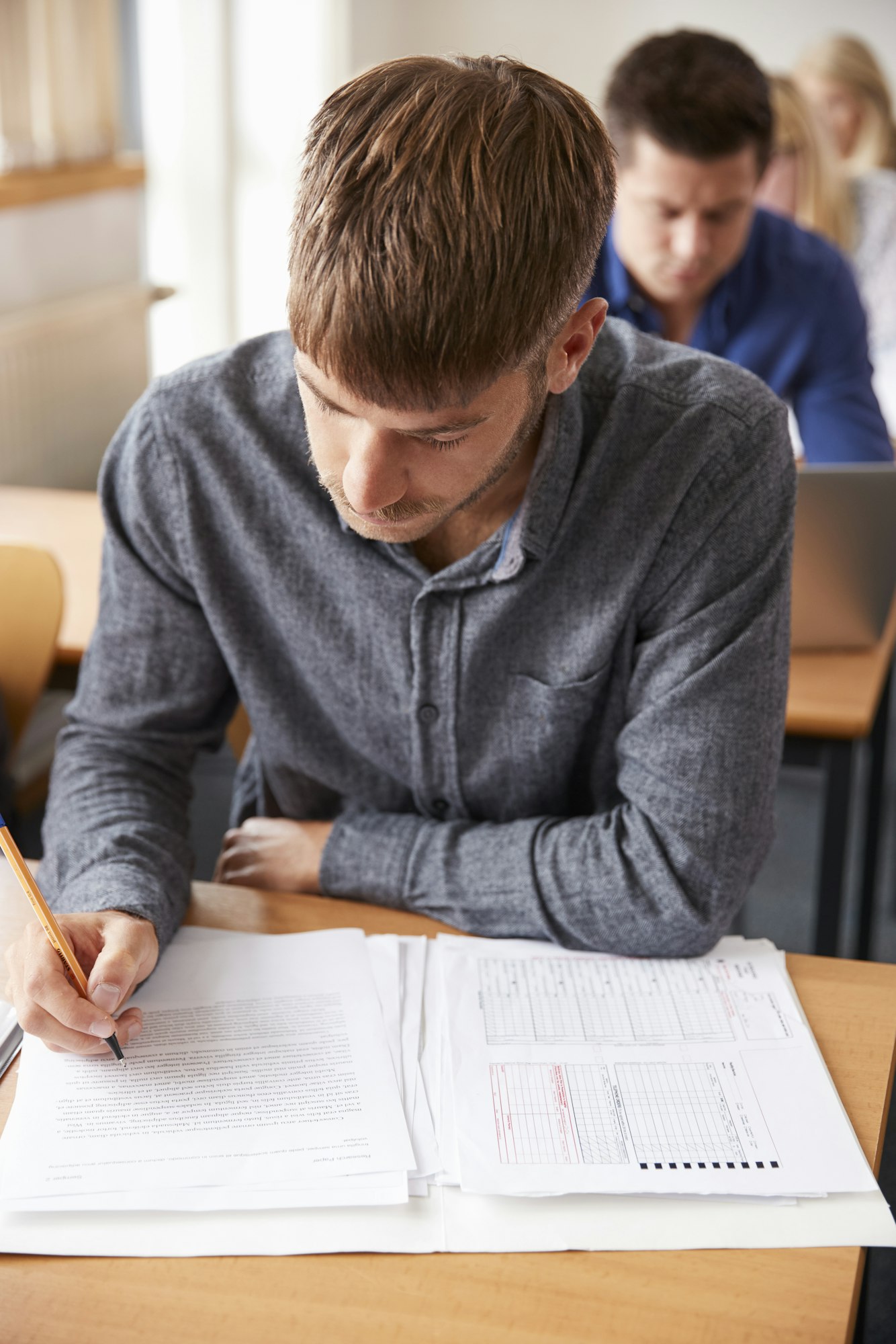 Mature Male Student Attending Adult Education Class